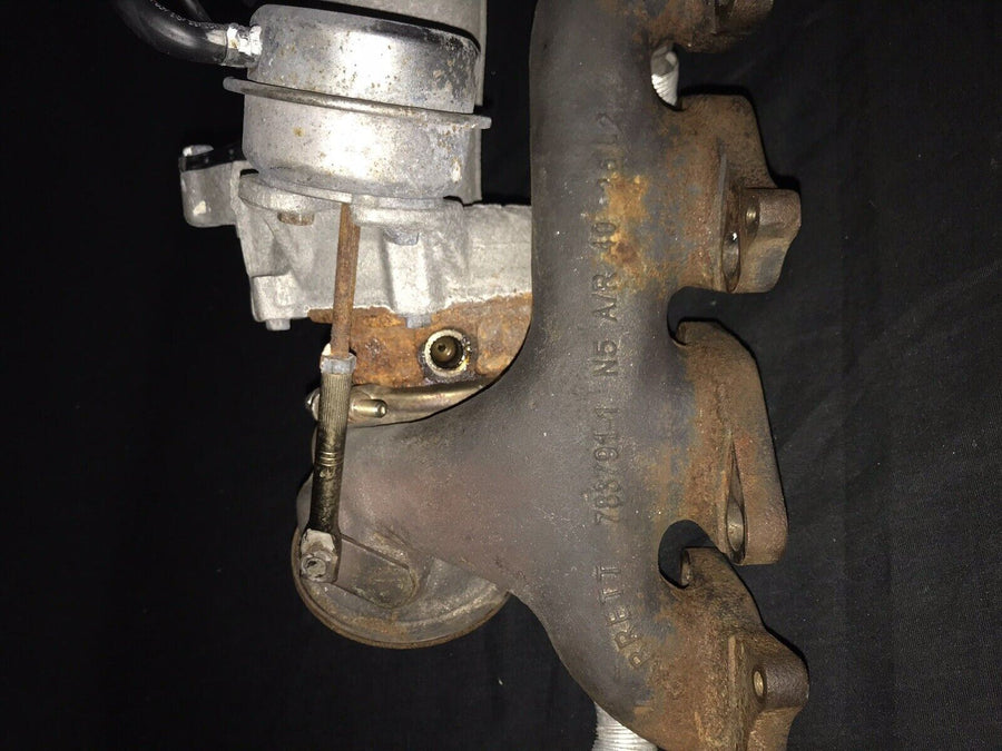 Chevrolet Sonic OEM Garrett Turbocharger w/ Manifold 55565353 Trax Cruz (11-19)