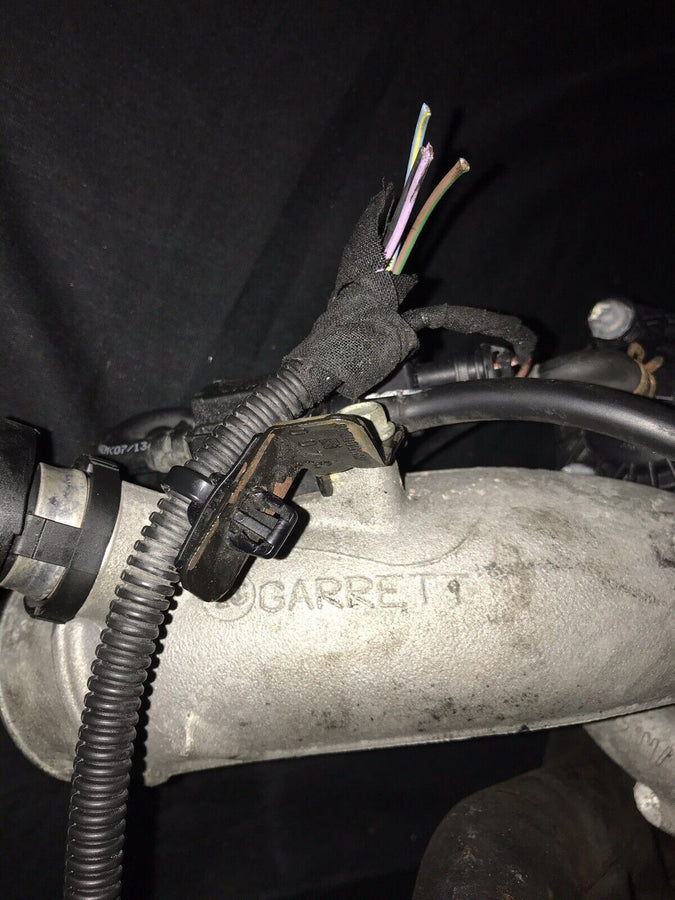 Chevrolet Sonic OEM Garrett Turbocharger w/ Manifold 55565353 Trax Cruz (11-19)