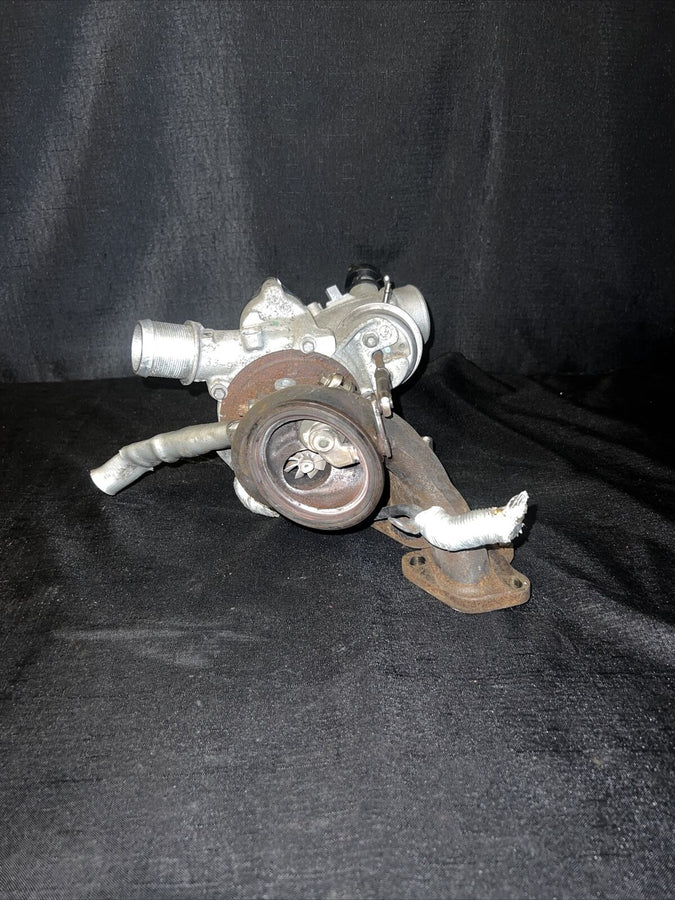 Chevrolet Sonic OEM Garrett Turbocharger w/ Manifold 55565353 Trax Cruz (11-19)