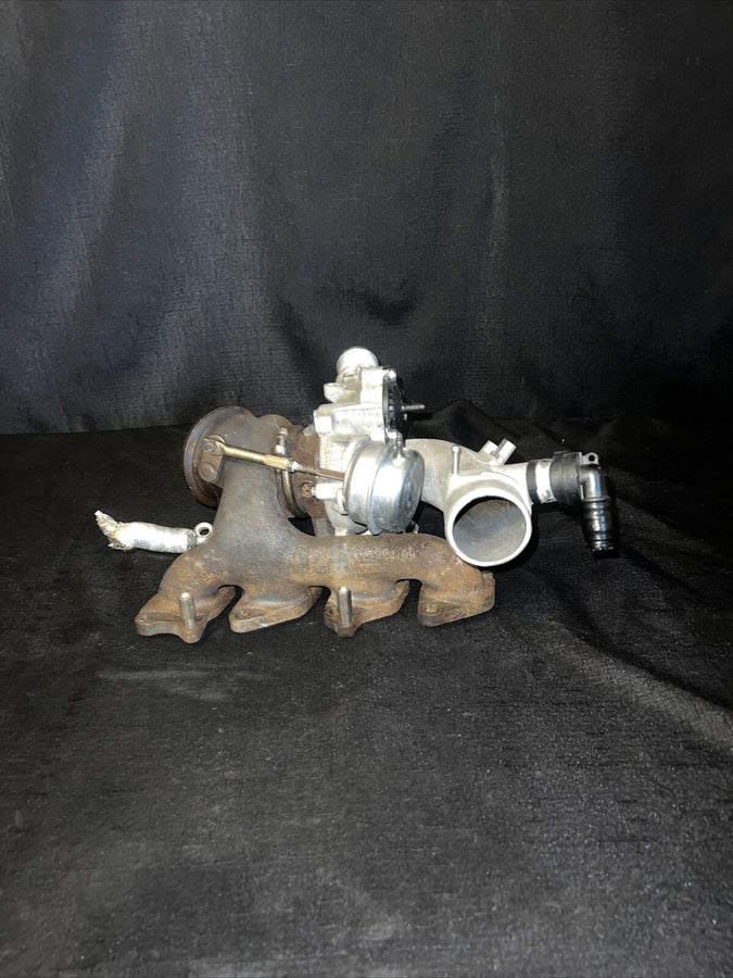 Chevrolet Sonic OEM Garrett Turbocharger w/ Manifold 55565353 Trax Cruz (11-19)