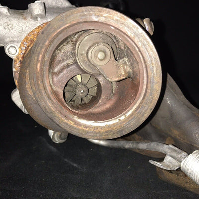 Chevrolet Sonic OEM Garrett Turbocharger w/ Manifold 55565353 Trax Cruz (11-19)