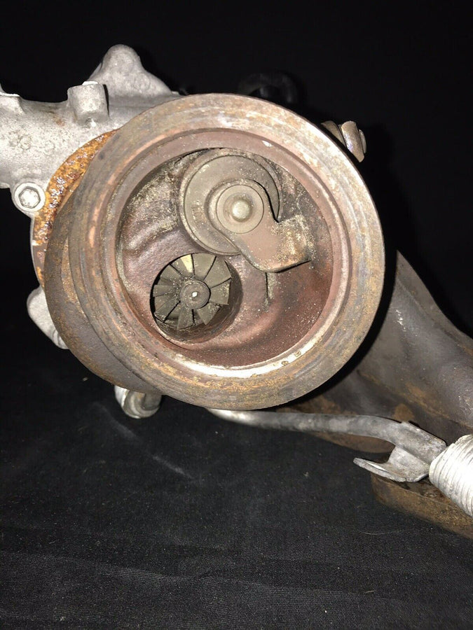 Chevrolet Sonic OEM Garrett Turbocharger w/ Manifold 55565353 Trax Cruz (11-19)