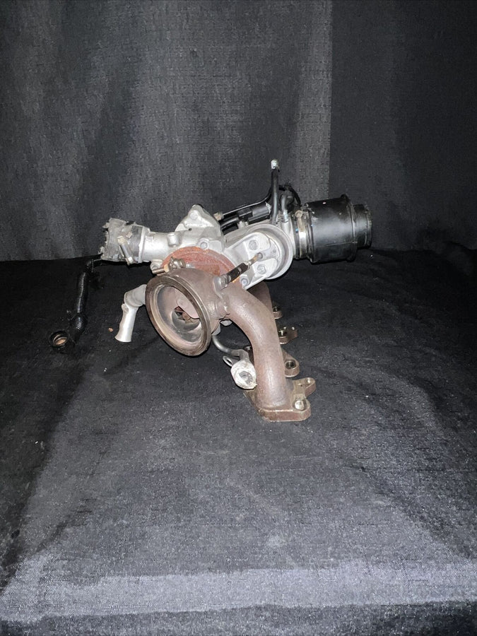 Chevrolet Cruz Garrett Turbocharger w/ Manifold 55565353 Trax Sonic (11-19)OEM