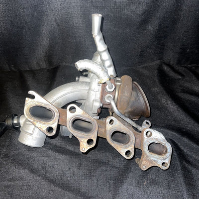 Chevrolet Sonic OEM Garrett Turbocharger w/ Manifold 55565353 Trax Cruz (11-19)