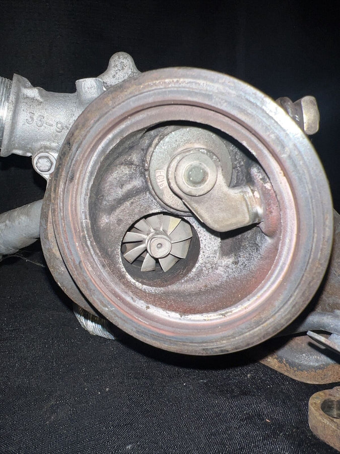 Chevrolet Sonic OEM Garrett Turbocharger w/ Manifold 55565353 Trax Cruz (11-19)