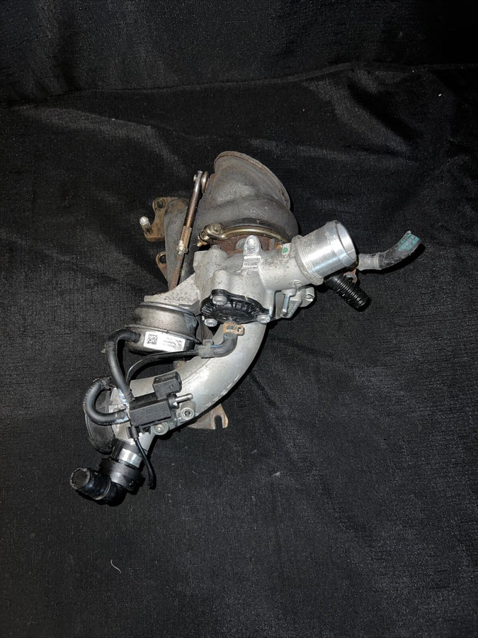 Chevrolet Cruz Garrett Turbocharger w/ Manifold 55565353 Trax Sonic (11-19)OEM