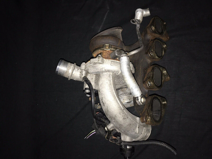 Chevrolet Sonic OEM Garrett Turbocharger w/ Manifold 55565353 Trax Cruz (11-19)