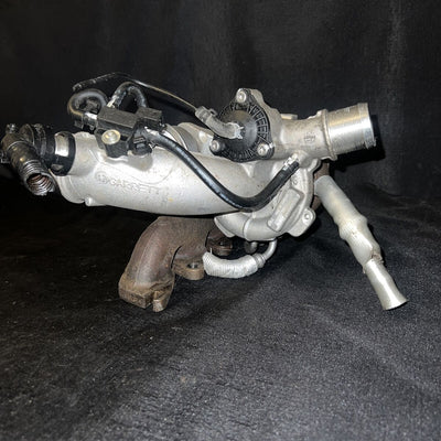 Chevrolet Sonic Garrett Turbocharger w/ Manifold 55565353 Trax Cruz (11-19)OEM
