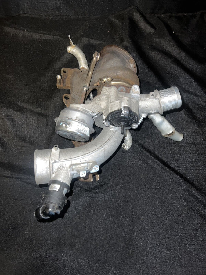Chevrolet Sonic OEM Garrett Turbocharger w/ Manifold 55565353 Trax Cruz (11-19)