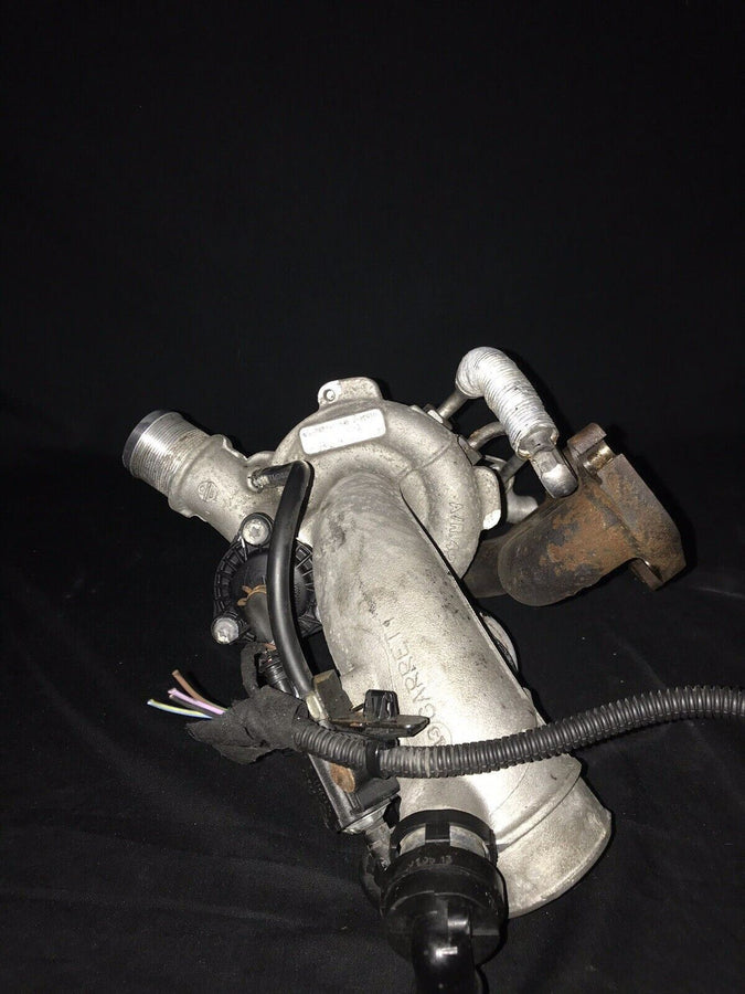 Chevrolet Sonic OEM Garrett Turbocharger w/ Manifold 55565353 Trax Cruz (11-19)